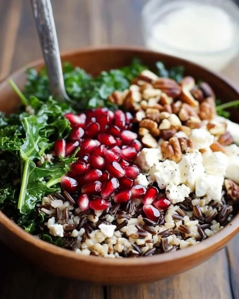 Pomegranate, Kale, and Wild Rice Salad with Walnuts and Feta